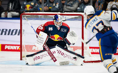 JJ Perterka and Simon Wolf compete during the grand opening of the SAP Garden, the new home of the EHC Red Bull München in Munich, Germany on September 27, 2024.