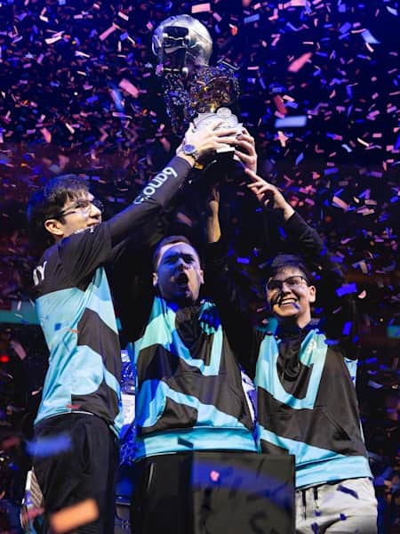 Cloud9's Rocket League team raise the RLCS championship trophy