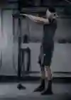 The explosive kettlebell swing being perfumed by an athlete.