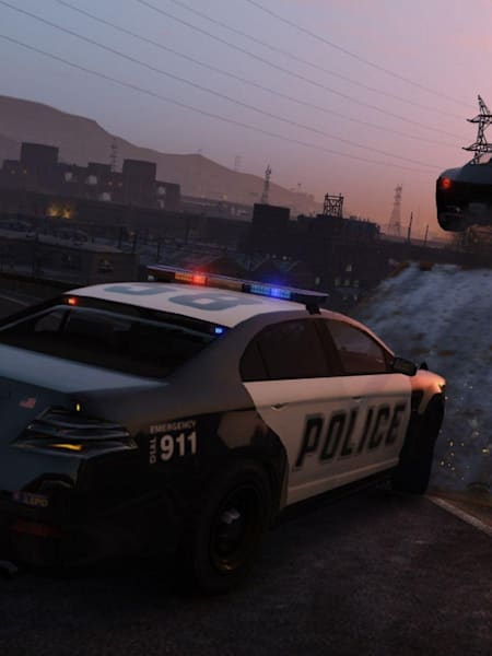 A screenshot of a police chase in Grand Theft Auto V
