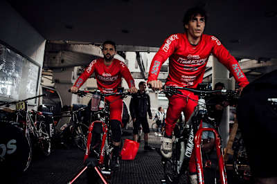 Amaury Pierron and team-mate warm-up ahead of racing at Val di Sole, Italy.