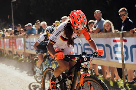 Elisabeth Brandau looks tired as she competes during the XCC race at Rd 6 of the UCI MTB World Cup 2019 in Lenzerheide, Switzerland.