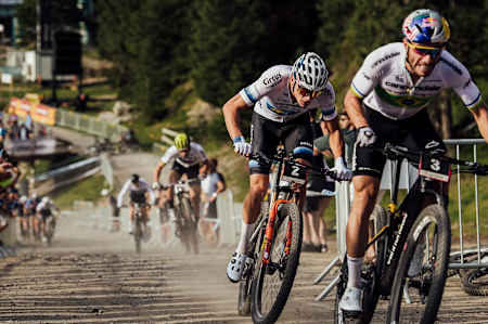 Henrique Avancini leads Mathieu Van der Poel on the last lap of the XCC race at the UCI XCO World Cup at Lenzerheide, Switzerland, on August9, 2019.