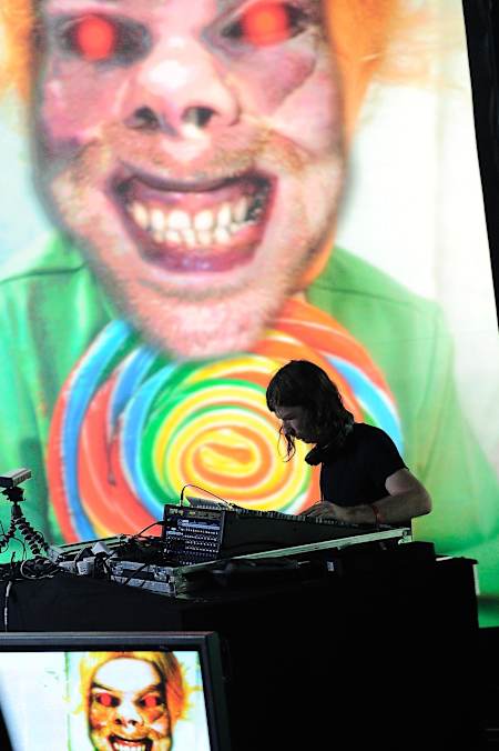 A photo of Aphex Twin performing live at the Pitchfork Music Festival in Paris in 2011.