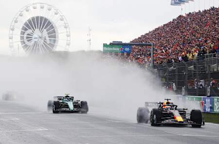 Max Verstappen leads Fernando Alonso driving the (14) Aston Martin AMR23 Mercedes during the F1 Grand Prix of The Netherlands at Circuit Zandvoort on August 27, 2023 in Zandvoort, Netherlands.