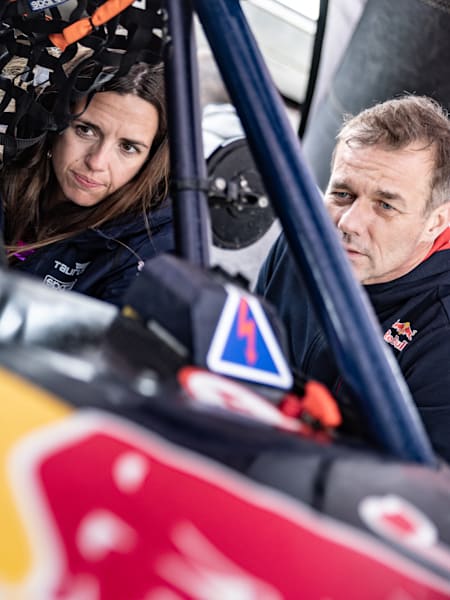 Cristina Gutierrez and Sébastien Loeb at the bivouac before BP Ultimate Rally-Raid 2024 in Grandola, Portugal, on April 2, 2024.