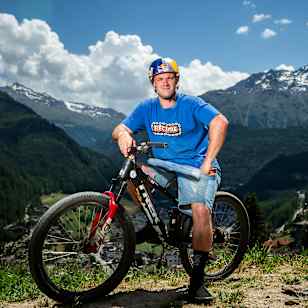 Kade Edwards poses with his mountain bike during the Swatch Nines event in Sölden, Austria. 