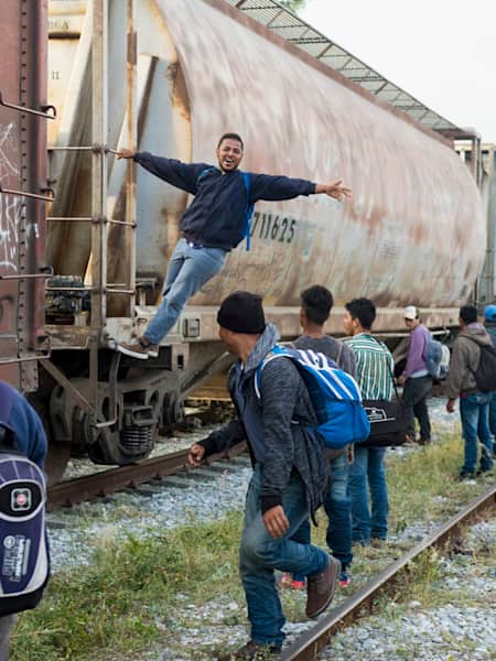 After travelling across southern Mexico, many board a train in Oaxaca