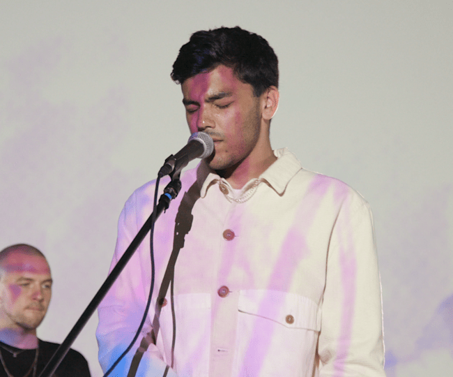 jamie isaac performs doing better and maybe videos