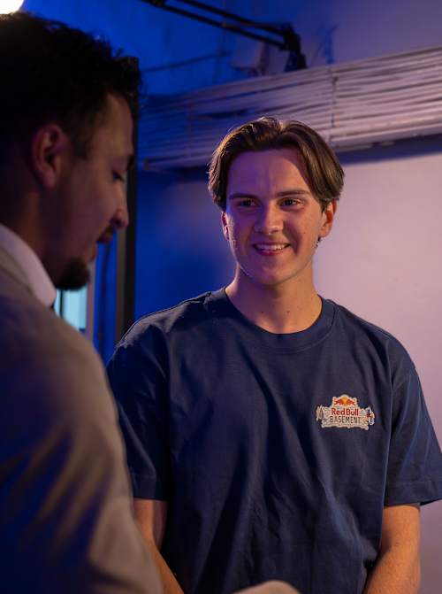 A winner of Red Bull Basement National Final 2026 stands by his project display in Stockholm, Sweden, showcasing innovation and dynamic energy at the event