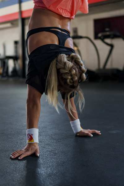 Haley Adams holds a handstand during training in Nashville, Tennessee, USA in 2026.