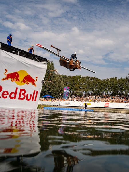 Participants perform during the Red Bull Flugtag in Vienna, Austria on September 26, 2021.