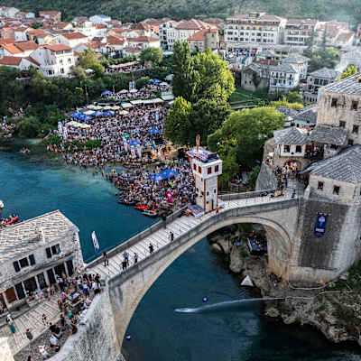 On 6 September 2025, David Colturi dives from the 27.5m platform atop Stari Most, thrilling crowds during the Red Bull Cliff Diving World Series stop in Mostar, Bosnia and Herzegovina