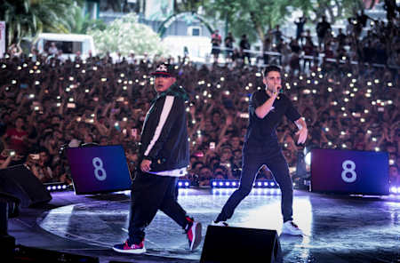 Mc Wos and Mc Aczino perform during Red Bull Batalla de Los Gallos World Final at Club Hipico Argentino in Buenos Aires, Argentina on December 09, 2018.
