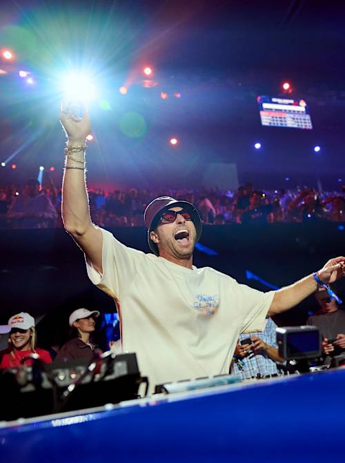 In 2026, Fisher enjoys a hands-in-the-air moment at Red Bull BassLine in Melbourne, Australia.