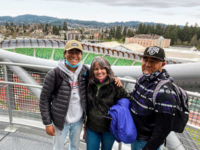 Ku, pictured with his mother, Misty, and father, Delmar, is now attending the University of Oregon.