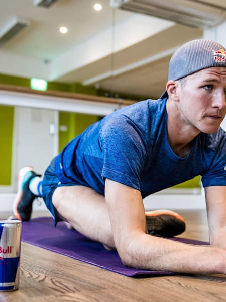 Tom Evans stretching after a workout