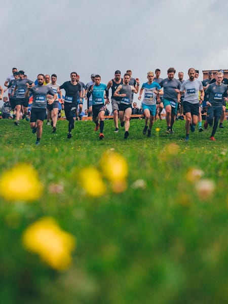 Competitors charge out of the start at Red Bull 400 in Štrbské Pleso