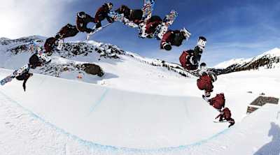 Shaun White nails a frontside double cork 1080 amidst the pristine snow-covered landscapes of Silverton, 2009.