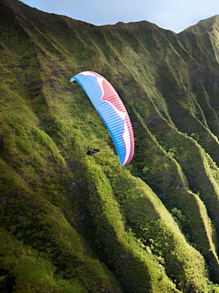 If you want to take off on a tropical vacation, try paragliding near Makapuu Point in Oahu.