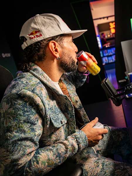 Freestyle footballer Sean Garnier plays EA Sports FC 26 at a launch event in London on September 17, 2025.