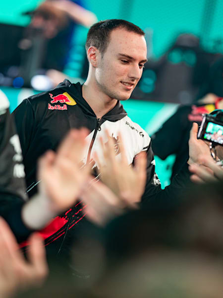 A picture of three members of the G2 Esports team