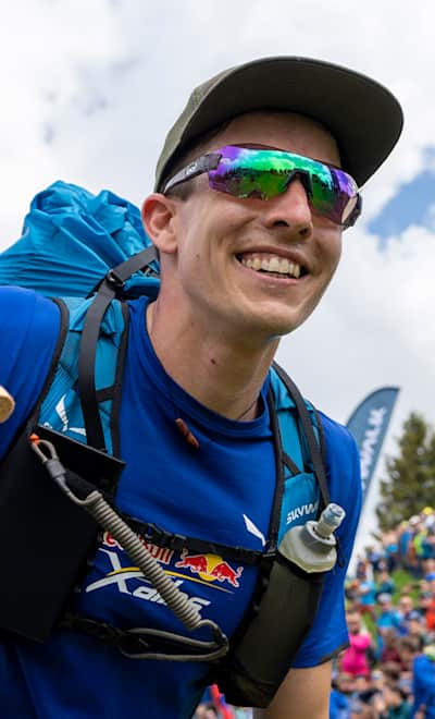 Simon Oberrauner (AUT1) hiking on Hahnenkamm, Austria.