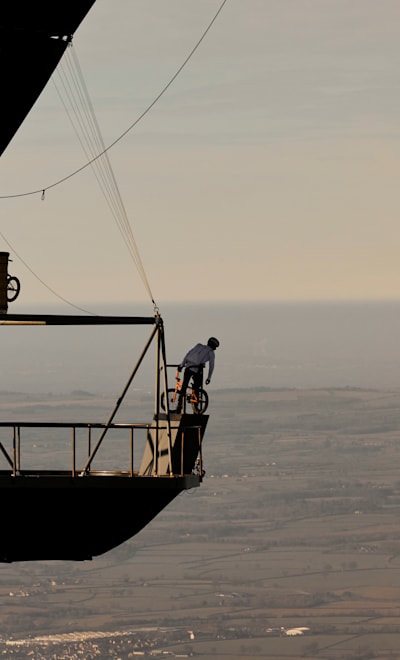 BMX legend Kriss Kyle looks over the edge of the carbon fibre skatepark suspended from a hot air balloon in his epic BMX film Don't Look Down.