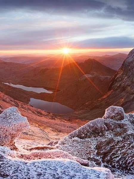 A photograph on top of Mount Snowdon, an hour before sunrise