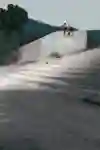 Zion Wright does switch frontside 180 ollie into the bank while filming YOU GOOD?