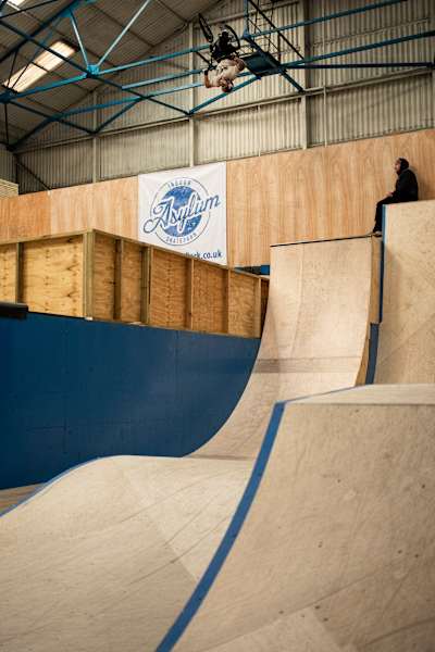 Kieran Reilly practices a flair trick at Asylum Skatepark in Nottingham, England.