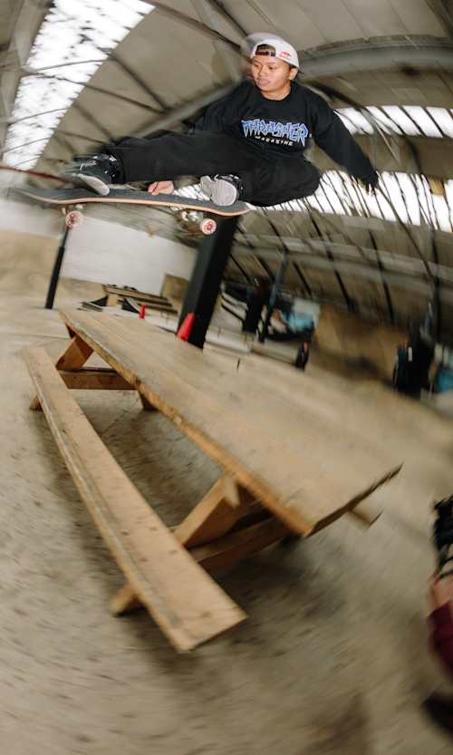 Margielyn Didal blasts a Sad grab over a picnic table in Glasgow