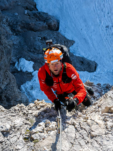 Christian Maurer climbs during Red Bull X-Alps 2023 in Italy