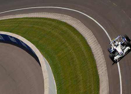 Sebastian Vettel racing in his first Formula One race, the 2007 US Grand Prix