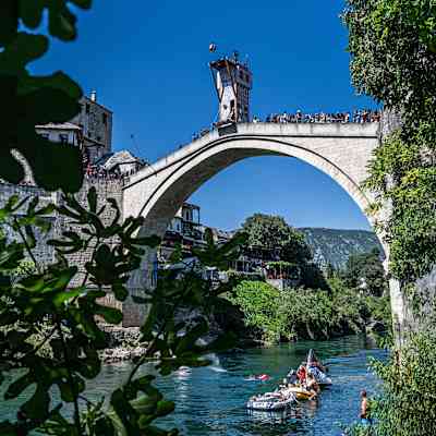 In 2023, Carlos Gimeno dives from Stari Most bridge in Mostar during Red Bull Cliff Diving World Series event
