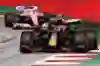 Alexander Albon of Aston Martin Red Bull Racing RB16 leads Sergio Perez of Racing Point RP20 Mercedes during the Formula One Grand Prix of Styria at Red Bull Ring on July 12, 2020.
