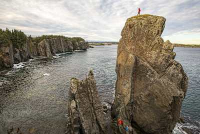 Will Gadd and Sarah Hueniken climb a sea stack near East Trinity, Newfoundland, Canada