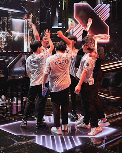 DRX huddles onstage at the VALORANT Champions 2022 Istanbul Playoffs. 