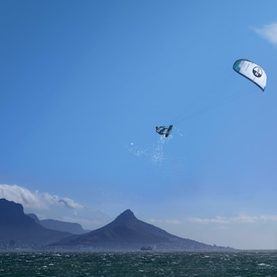 Kiteboarder airtime at Red Bull King of the Air in South Africa Cape Town beach.