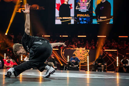 B-Boy Amir of Kazakhstan competes against Phil Wizard of Canada in final of the Red Bull BC One World Final in the ERGO Arena in Gdansk, Poland on November 6, 2021.