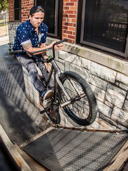 Jeff with a barspin fakie on a really tight set-up