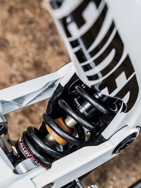 Close up of the Rockshox Vivid coil shock on Mark Wallace's Canyon Sender MTB in Fort William on June 2, 2017