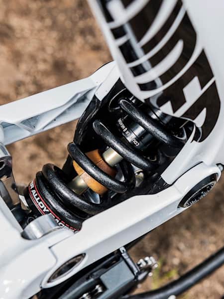 Close up of the Rockshox Vivid coil shock on Mark Wallace's Canyon Sender MTB in Fort William on June 2, 2017