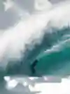 Surfer Tamayo Perry performs during the first swell of the 2019–20 winter season at Pipeline in Hawaii.