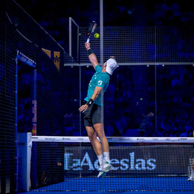 Alejandro Galán leaps for a powerful serve during the Final Premier Padel 2025 in Barcelona, Spain, thrilling fans at this high-energy championship match