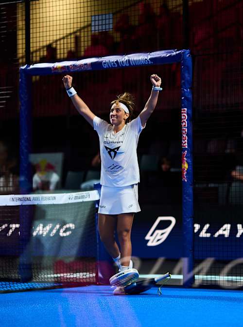 Beatriz González and Claudia Fernandez Sanchez rejoice on court during the 2026 Miami Premier Padel P1 semi-finals in the United States, surrounded by vibrant Red Bull branding