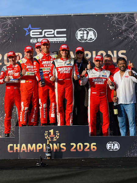 Members of Team MRF Tyres celebrate a fourth ERC Teams' title