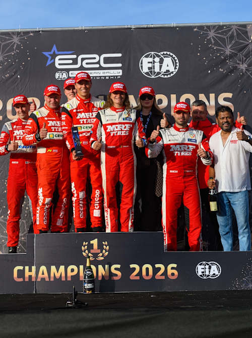 Members of Team MRF Tyres celebrate a fourth ERC Teams' title