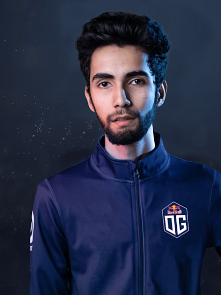 An image of Dota player SumaiL in an OG jacket