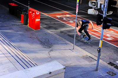 Jake Hayes doing a backside 180 at Martins Place